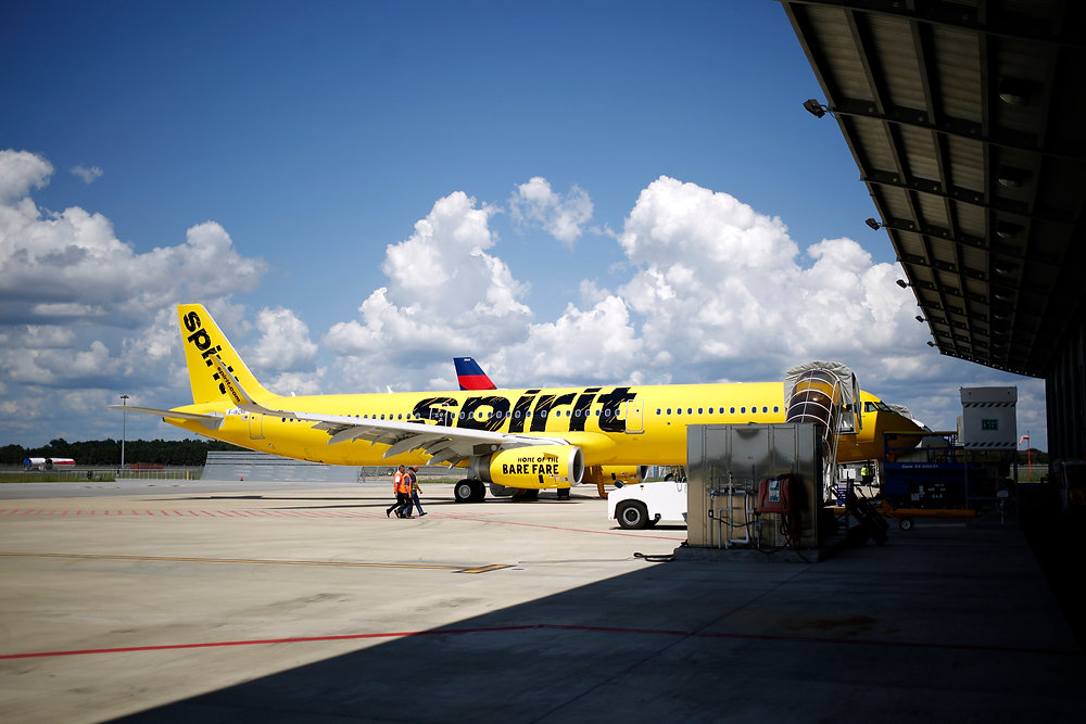 How do you change the name on a Spirit Airlines flight ticket?